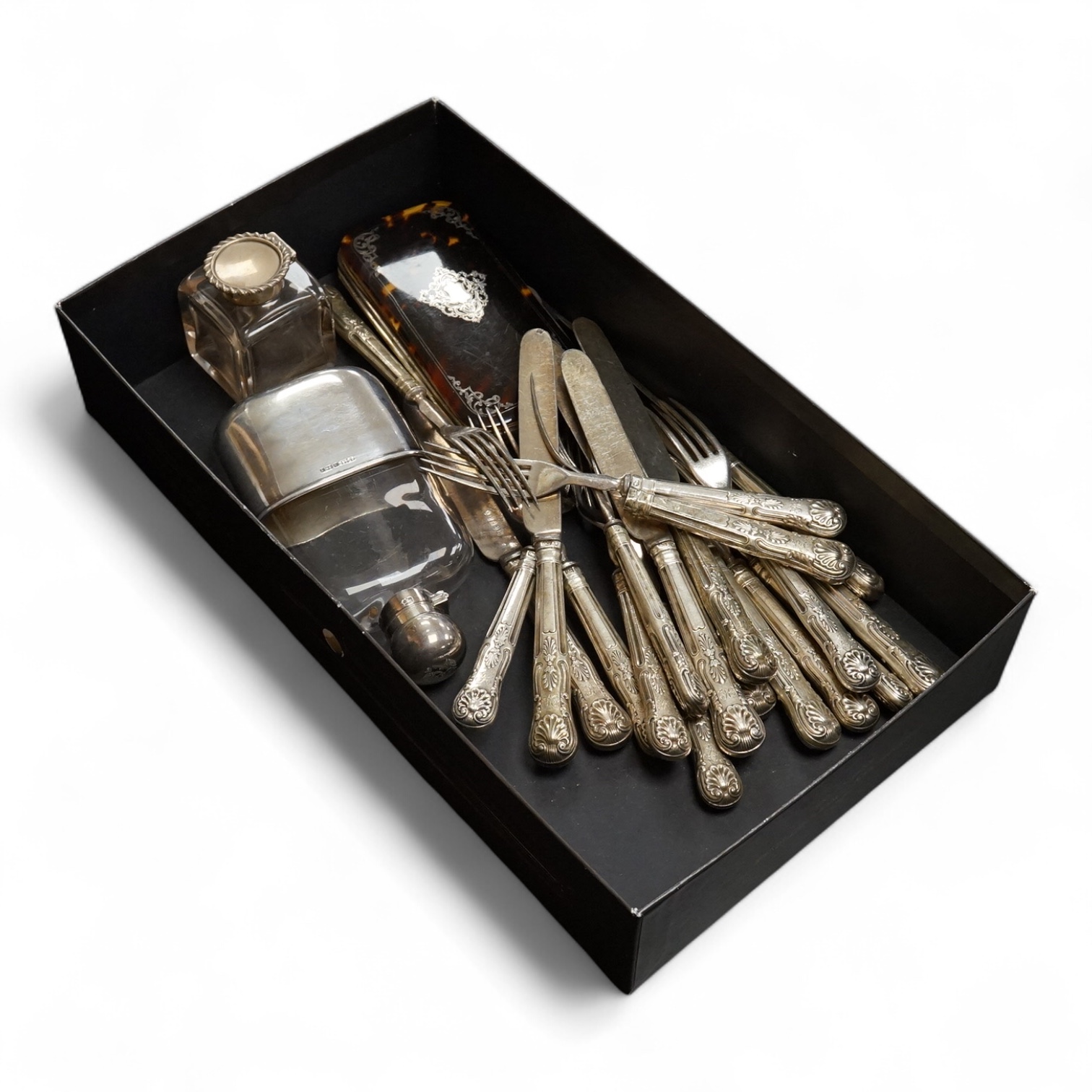 A late Victorian silver mounted glass hip flask, James Dixon & Sons, Sheffield, 1891, 15.5cm (lead solder), together with a silver mounted glass inkwell, assorted silver handled plated dessert eaters(a.f.) and a tortoise
